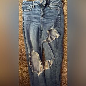 American Eagle Blue Jeggings with Distressed Details